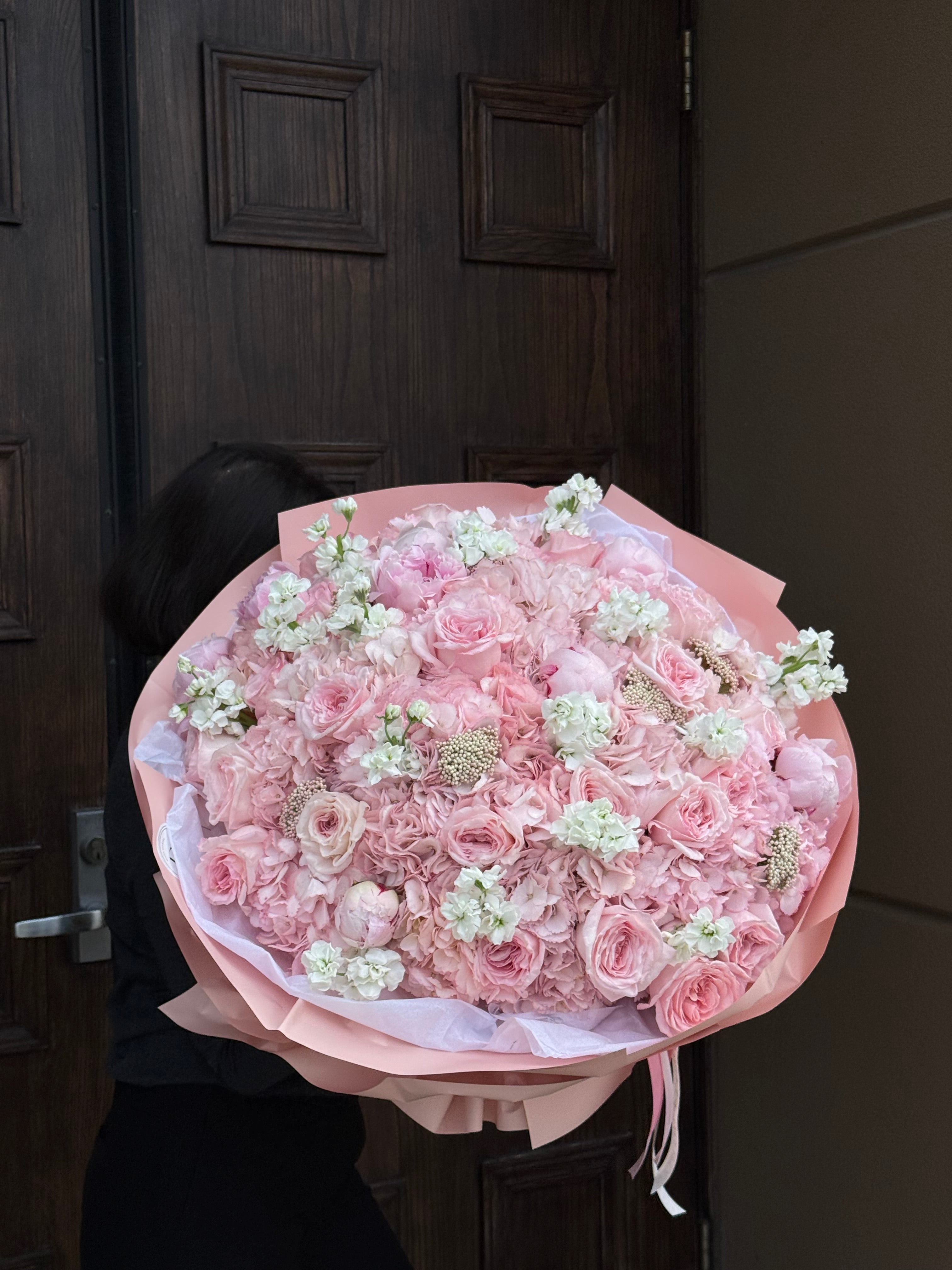 "All She Wants" bouquet: 25 hydrangeas, garden roses, or peonies in a soft, romantic style. Vase included. Photo confirmation sent before delivery in Chicago.