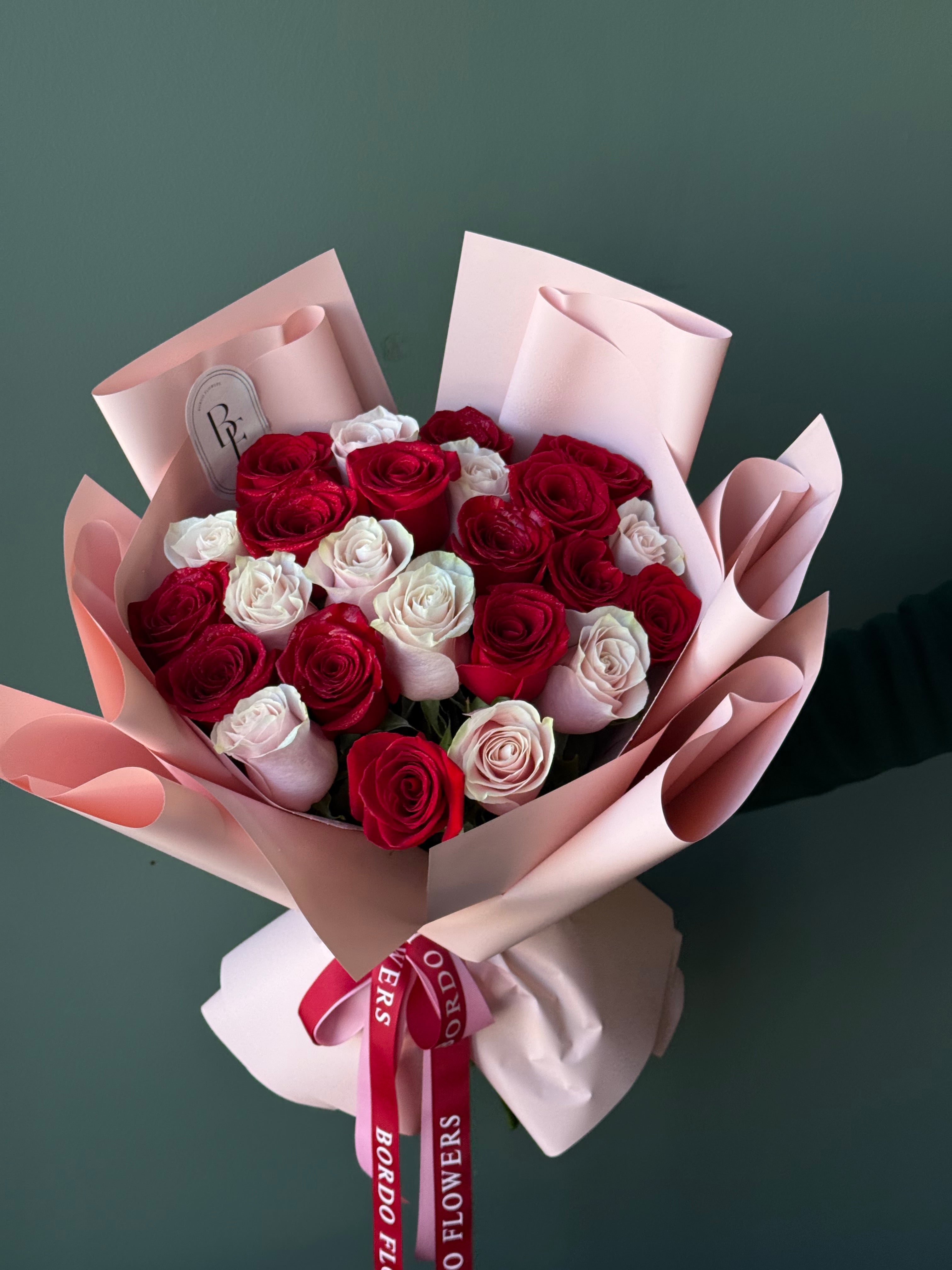 “2 Dozen of colored roses”