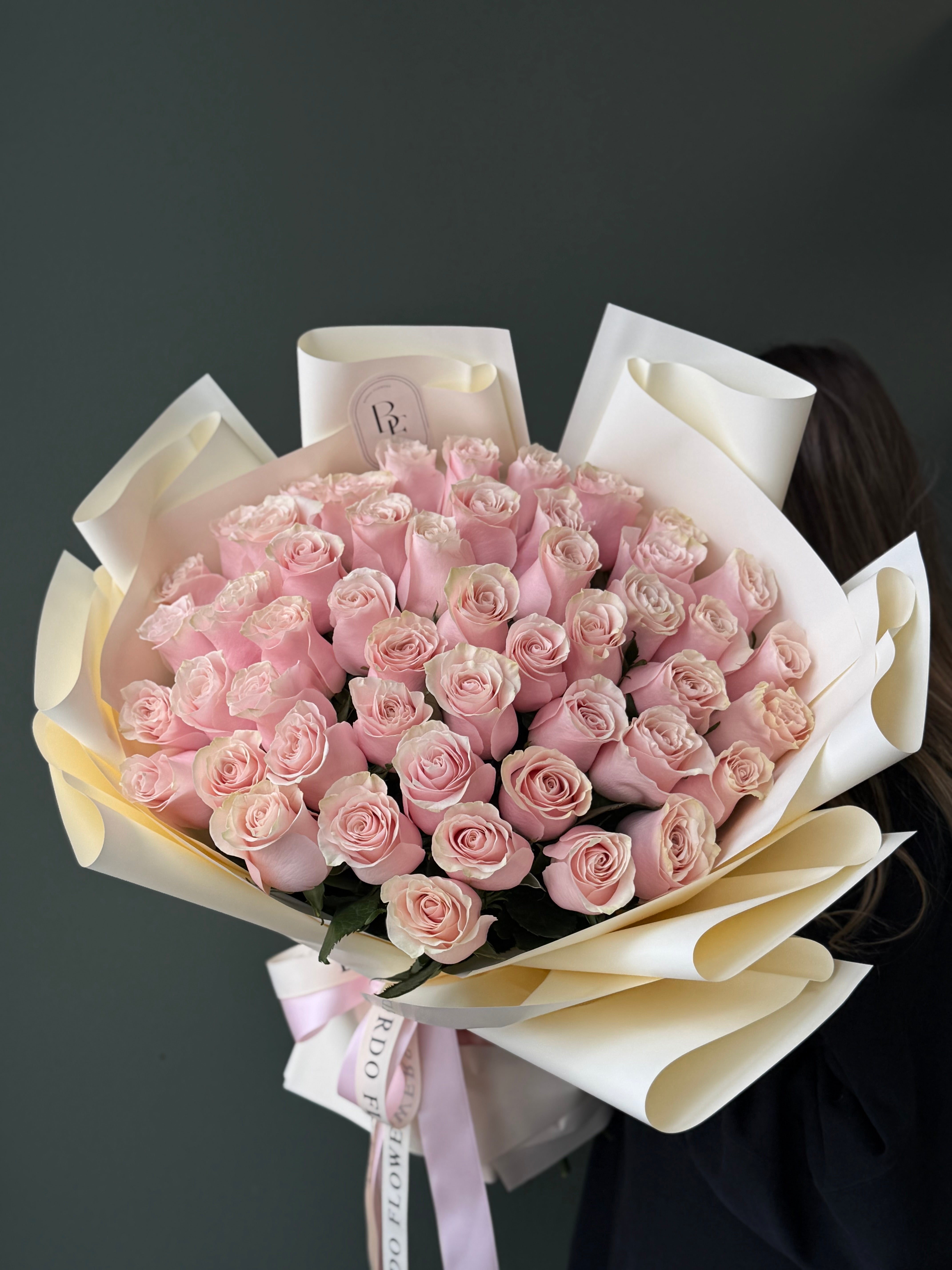 “75 colored roses in a bouquet”