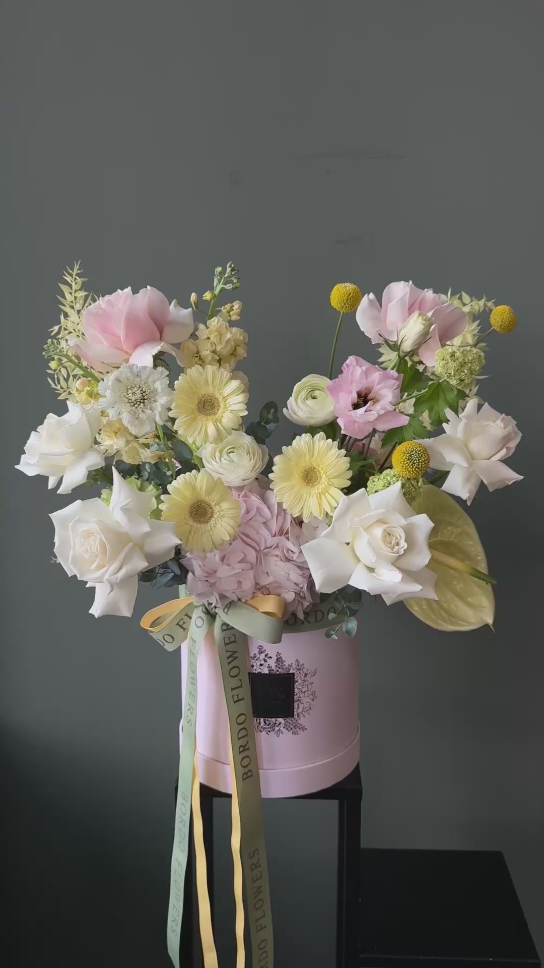 Italian-inspired floral box arrangement in sunny yellow tones