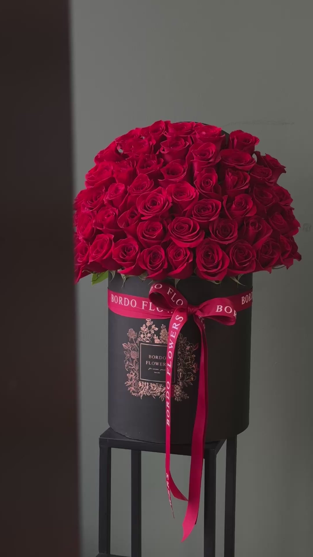 "50 Reasons Why" arrangement: 50 premium roses in a refined box design with a front-facing display. Includes wet floral sponge. Design confirmed in Chicago.