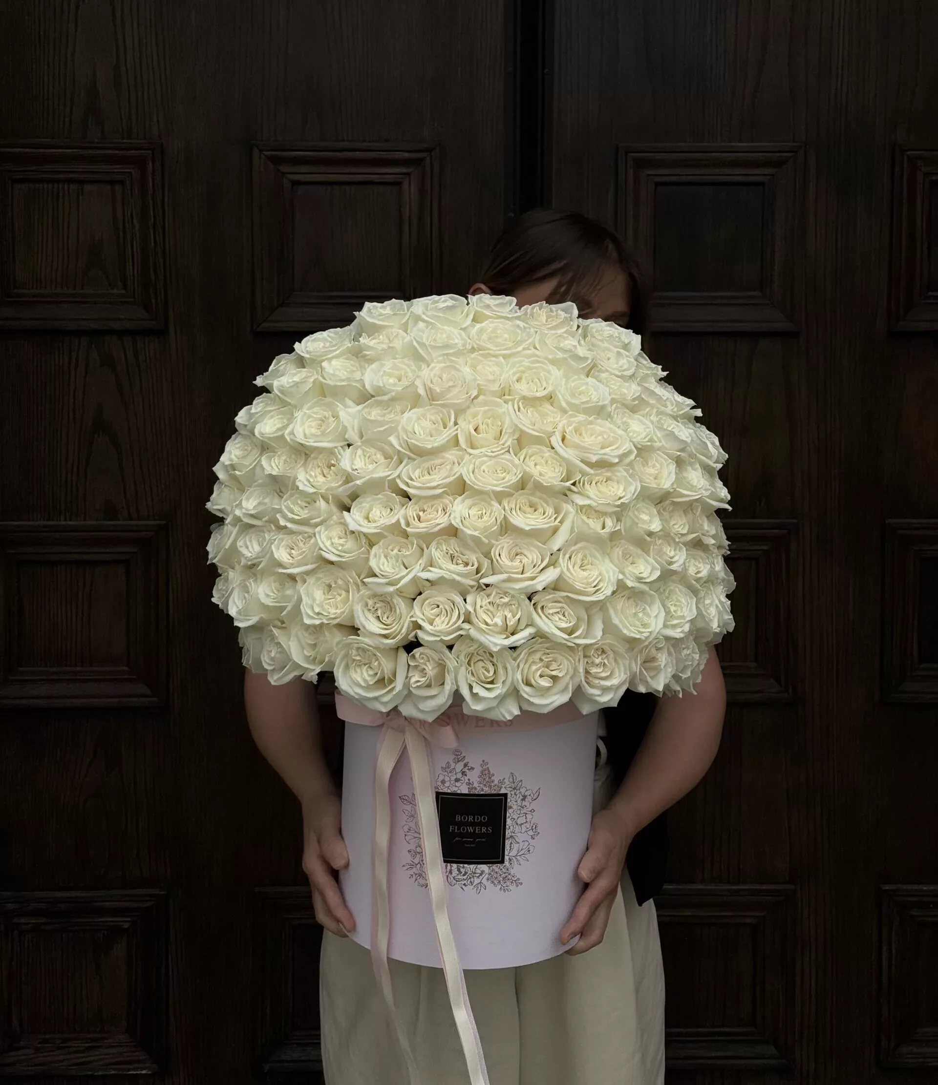 Best for Her is an exquisite large box arrangement featuring 100 stunning roses, carefully selected to make a heartfelt statement. This luxurious arrangement can showcase a beautiful mix of colors, including vibrant reds, soft whites, delicate pinks, and warm peaches, or a charming blend of two hues, creating a stunning visual impact. The box itself comes in elegant options of beige, pink, or black, perfectly complementing the vibrant colors of the roses and adding an extra touch of sophistication. This arrangement is perfect for expressing love, gratitude, or admiration, making it an ideal gift for special occasions or just to brighten her day. With its abundant blooms and elegant presentation, Best for Her is a true testament to your affection.