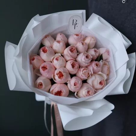 "Juliet" gardem roses bouquet, featuring 12, 24 and  36 exquisite garden roses in a striking hot pink hue. Each rose is hand-selected for its lush petals and captivating color, symbolizing love and admiration. This stunning bouquet is elegantly wrapped in your choice of variable colors—white, pink, black, or a special florist choice—allowing you to customize it for any occasion. Whether it's a heartfelt gift or a stylish centerpiece, the "Pink Expression" bouquet is sure to make a bold statement and convey your deepest emotions with grace and beauty. Available in 12, 24 and 36 garden roses in a bouquet. The main picture shows 24 roses in bouquet.